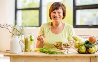 Happy woman enjoying healthy food
